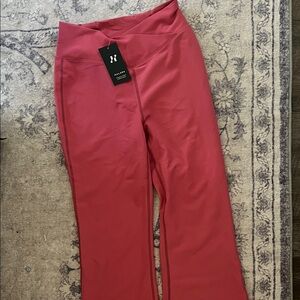 Pink Halara ribbed flares with hidden back pocket